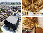 カヌー競技の全国優勝常連校「武庫川女子大学」の木造新築部室棟。船底の曲線を模した屋根に、リベットルーフ防水システムが採用。
